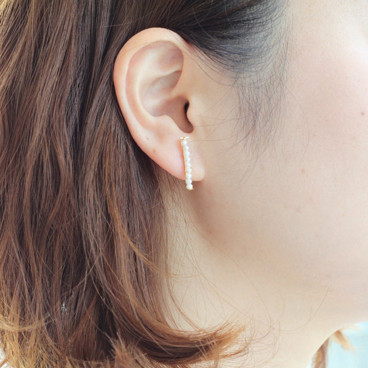 Freshwater pearl star bar post earrings in 18K yellow gold