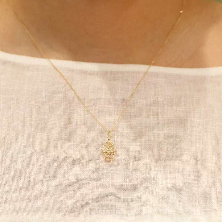 K10YG ダイヤ スカシモチーフ ペンダントトップ